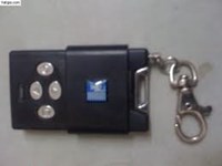 Tay khóa điều khiển cửa cuốn từ xa